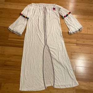 One size fits all pitusa cover up. White with colorful trim and pompoms